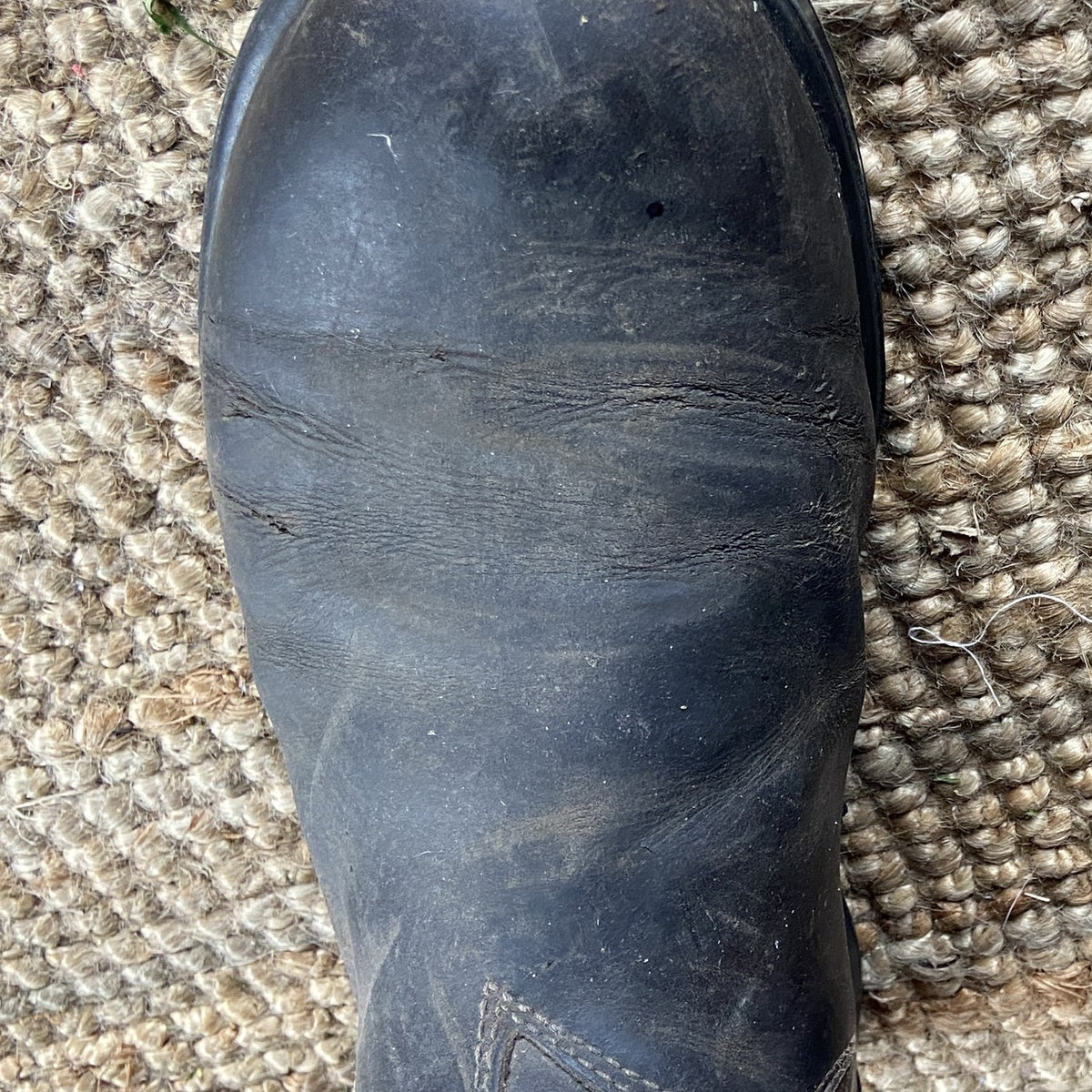 An Australian leather boot before Renapur, dry and scuffed